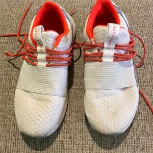 White Under Armour running shoes.  Size 8.